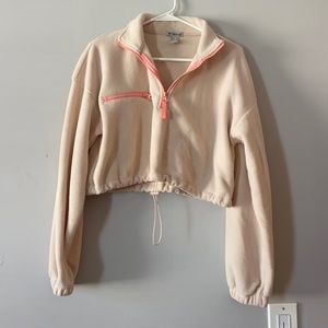 Comfortable cream jacket with pink sippers